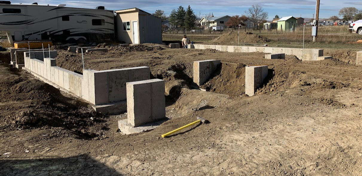 Side angle of a new construction wall and columns to support future steel building.