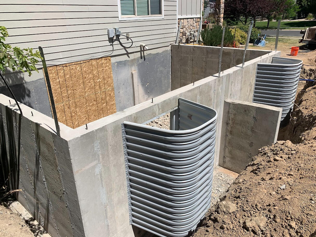 Concrete wall addition to extend existing house in Northern Colorado.