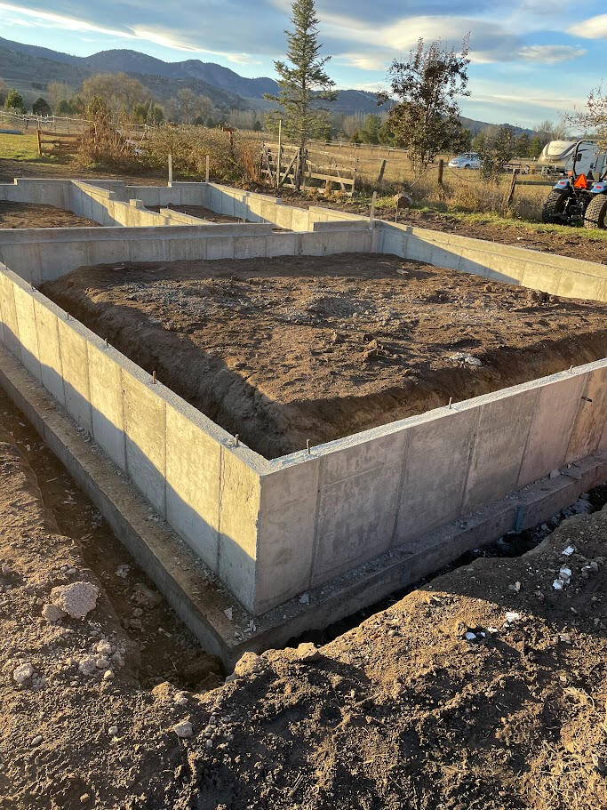Crawl-space foundation wall for living space in rural area.