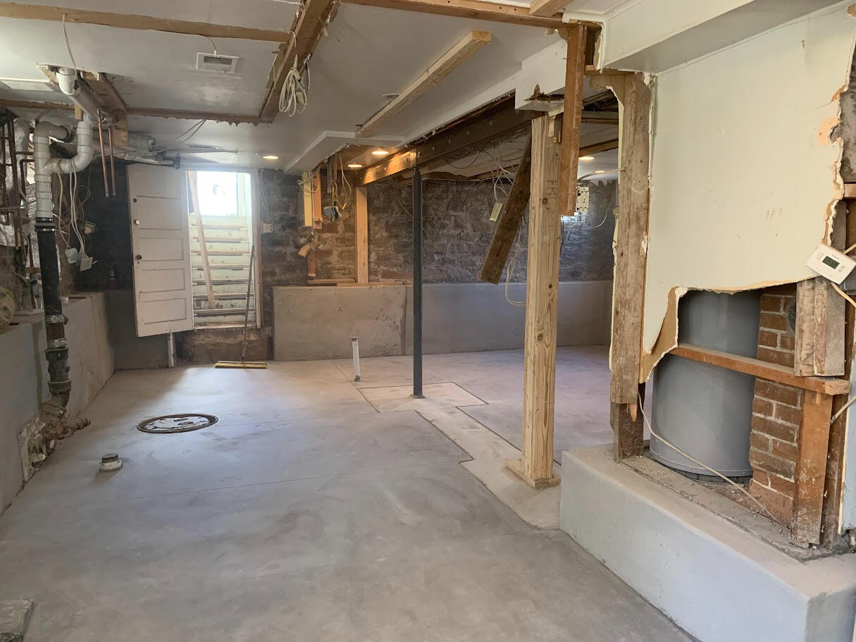 Newly poured concrete basement floor in residential addition in Fort Collins, CO.